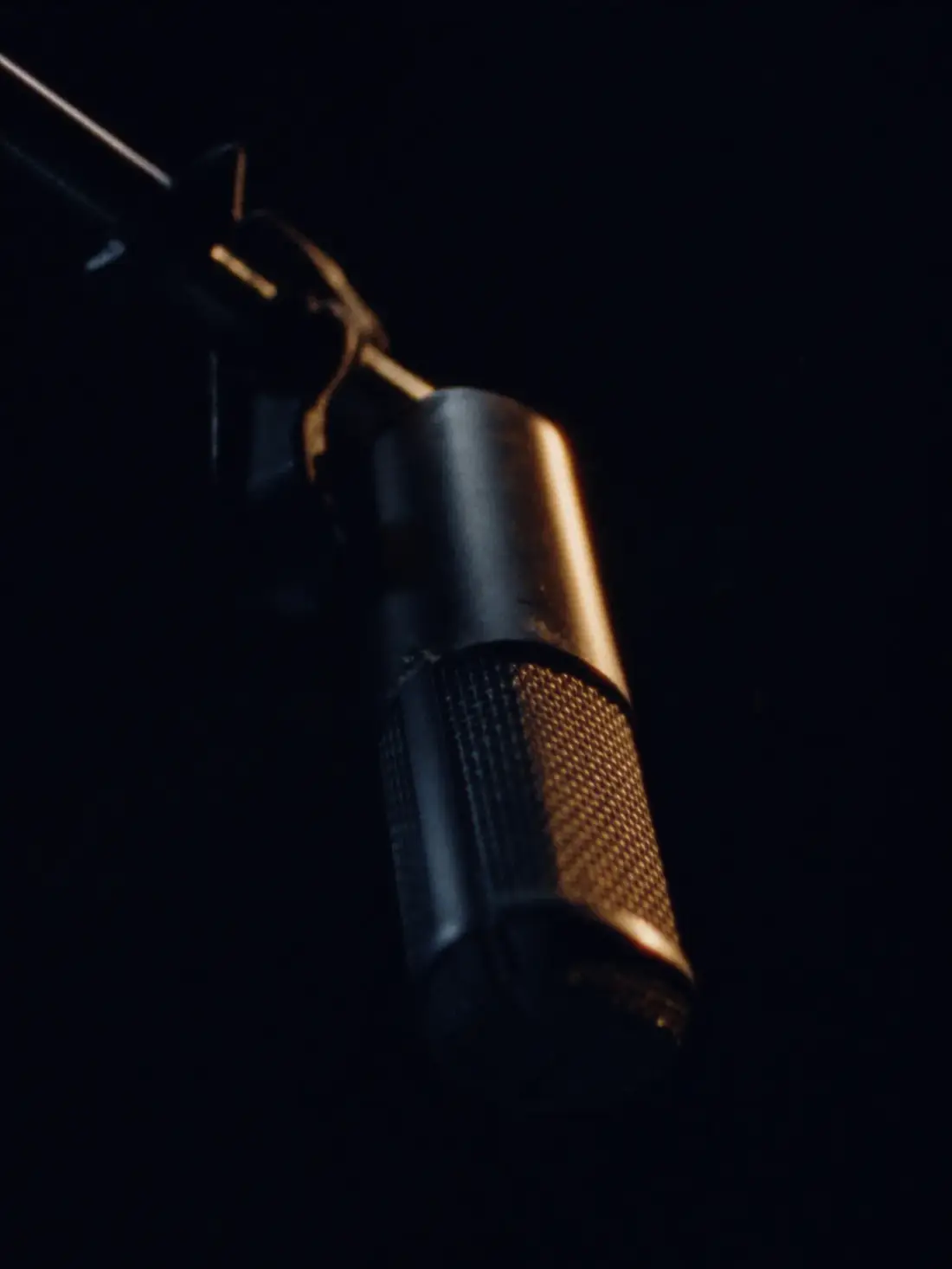 Broadcast microphone in dramatic light